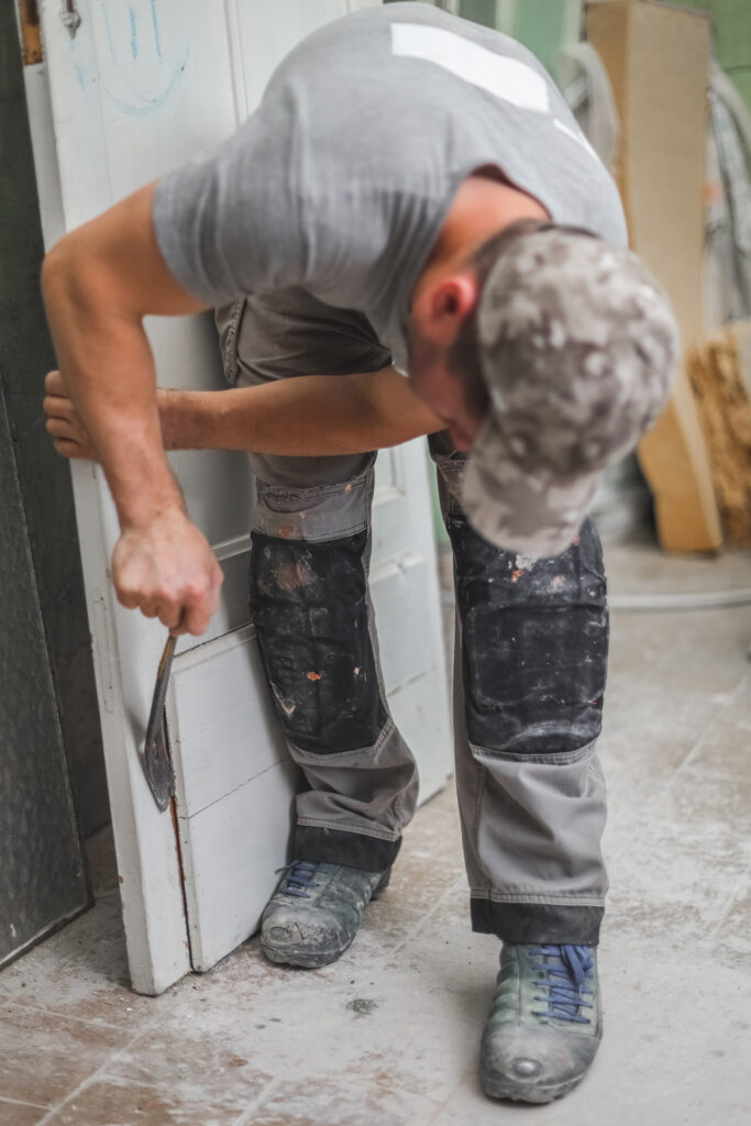 Professional door repair by Fix Find technician