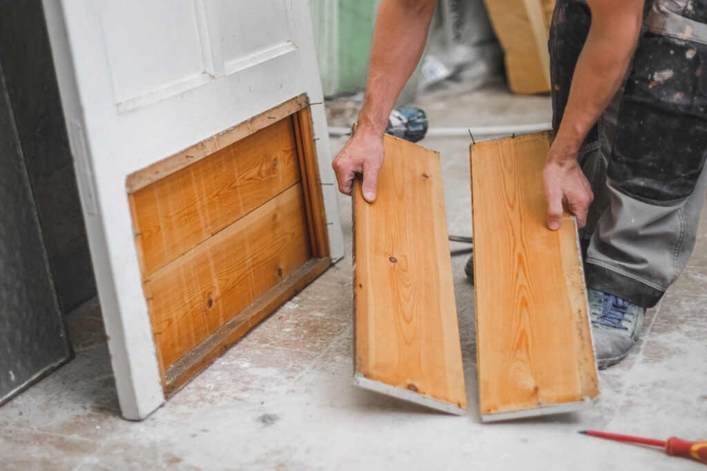 Front door repair with wood panel replacement