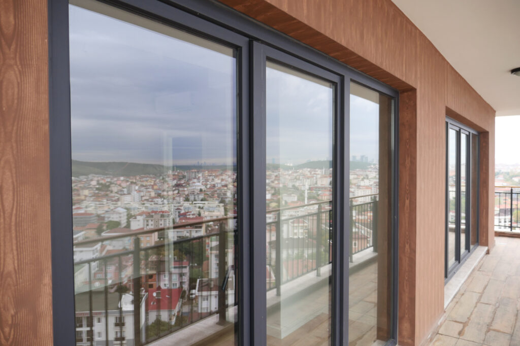 Modern glass patio door installation on Canadian condo