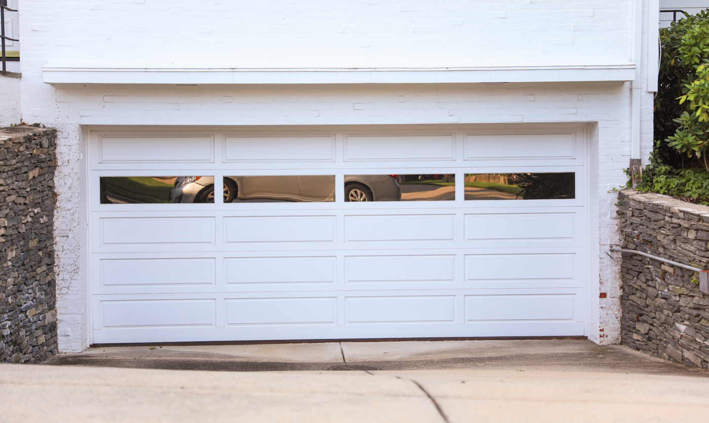 Modern garage door installation on luxury Canadian home