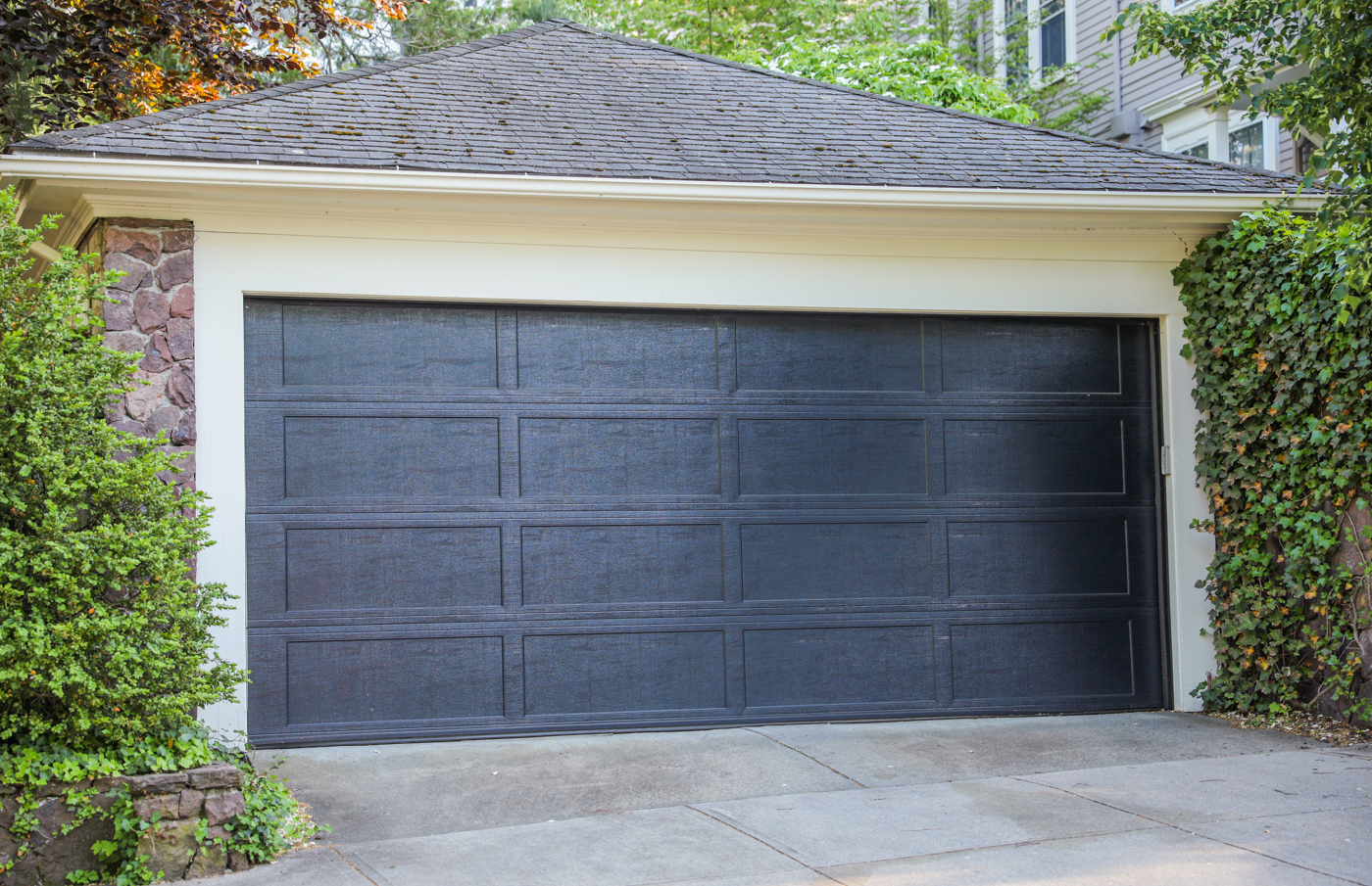 Double garage door installation on suburban Canadian home