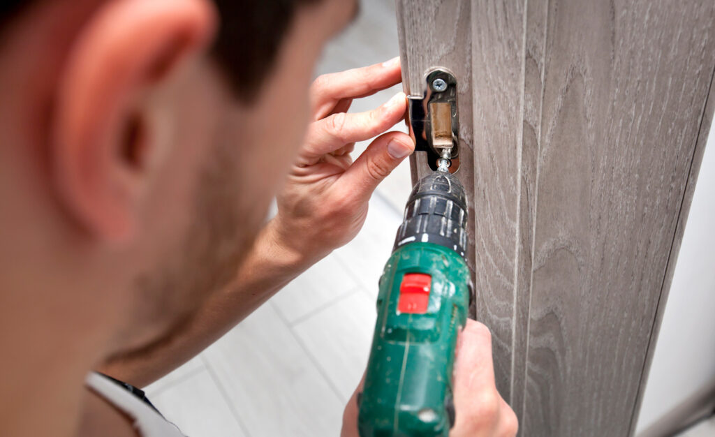 Door lock installation on wood by residential locksmith