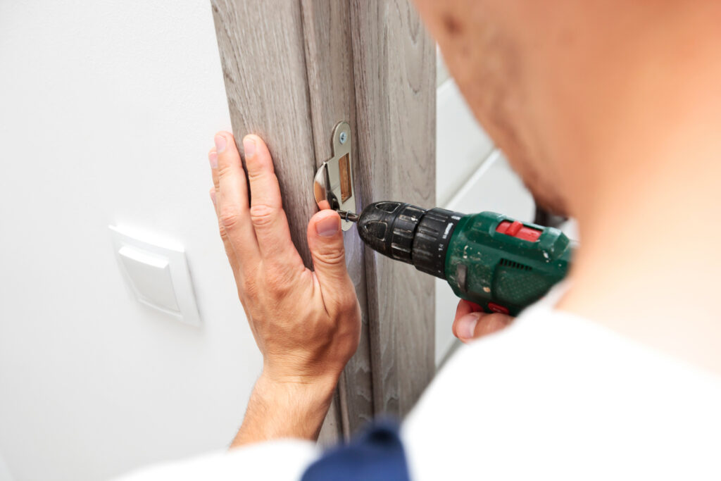 Lock installation on residential door for security grading