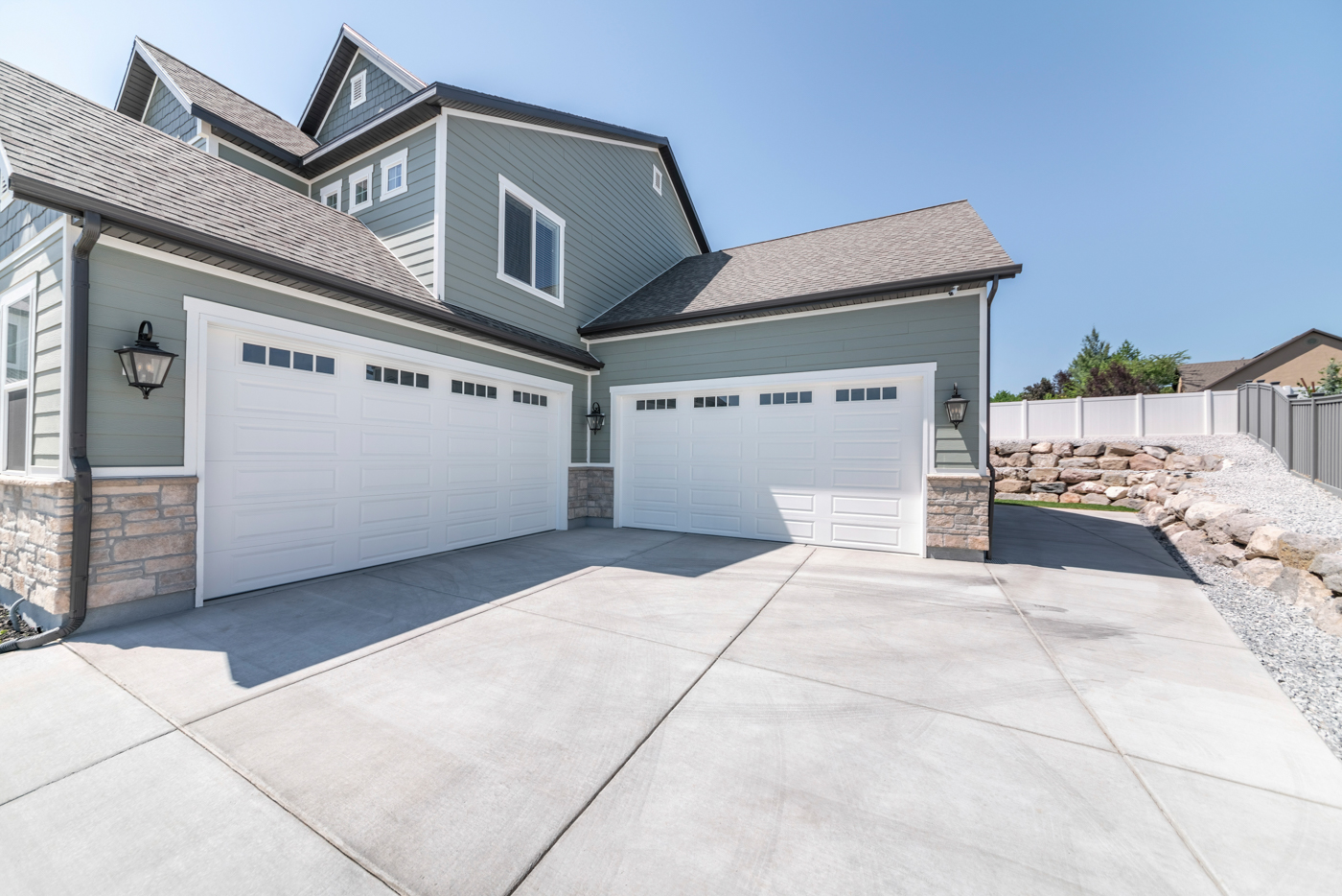 Modern white garage door on suburban home