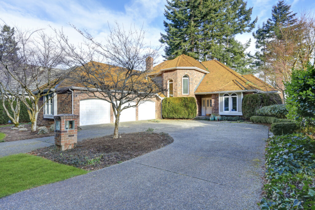 "Traditional garage doors on Canadian home"
