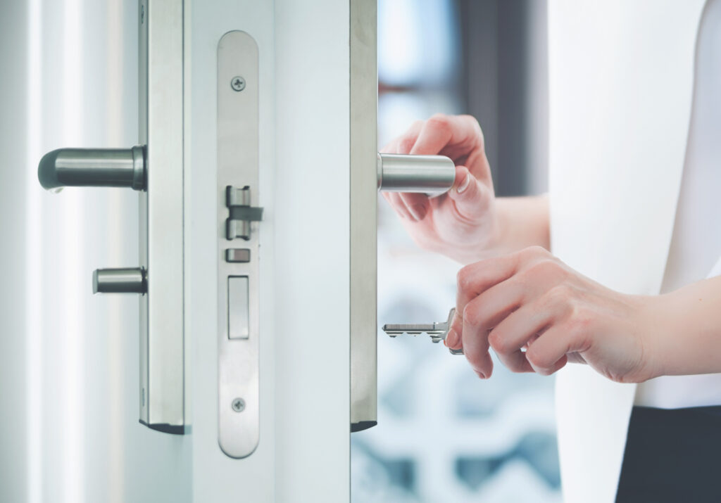 Key in hand unlocking accessible door knob